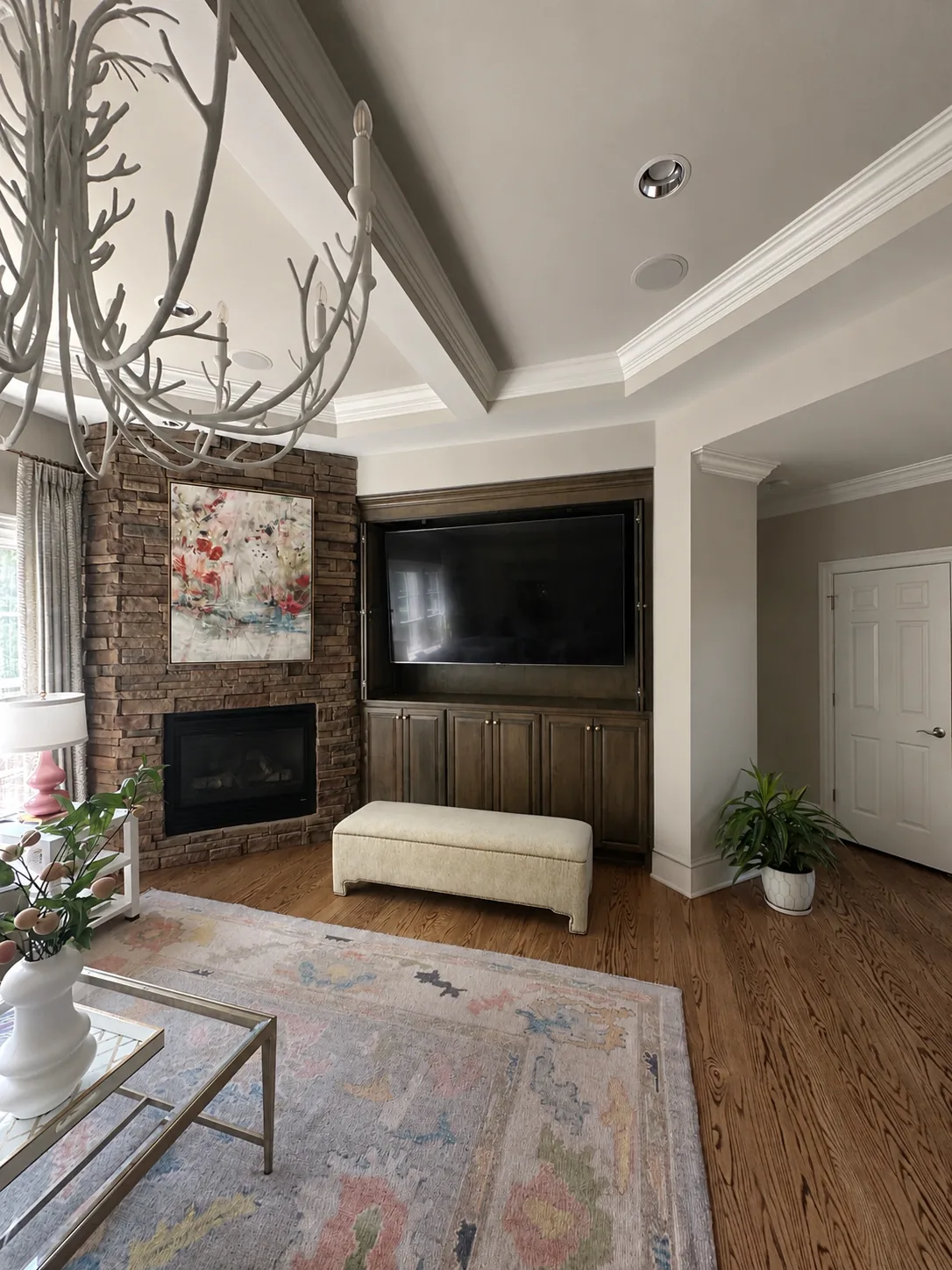 98 inch TCL TV in bonus room built-in cabinet wall Raleigh NC