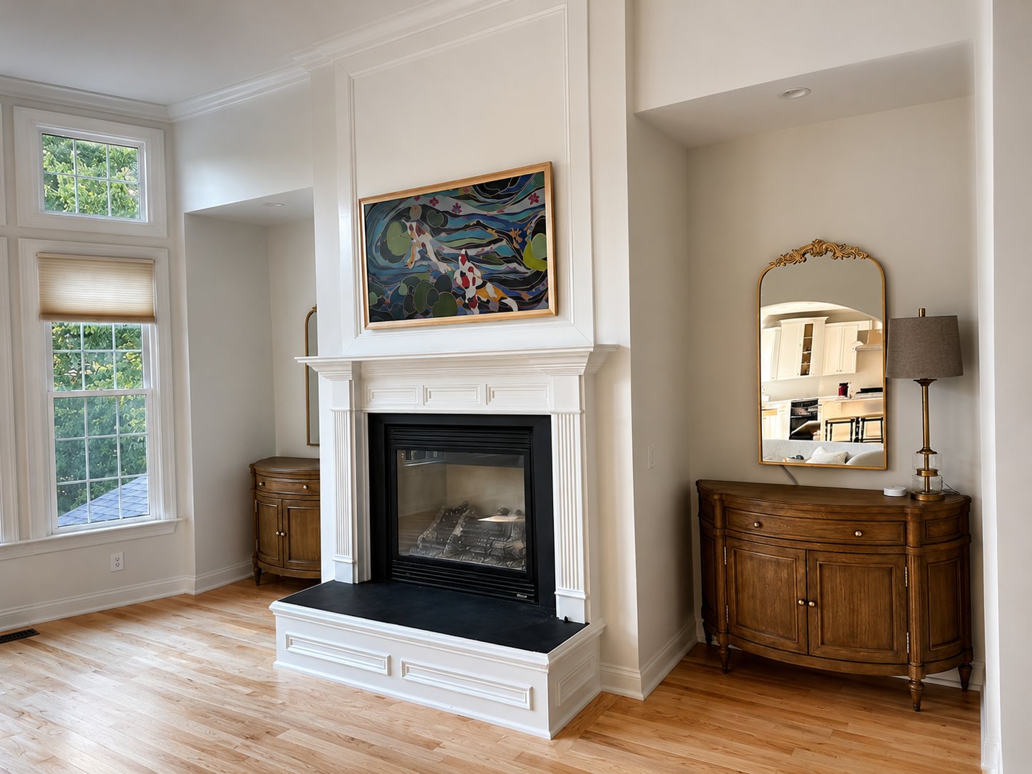 Samsung Frame TV above white fireplace Cary NC