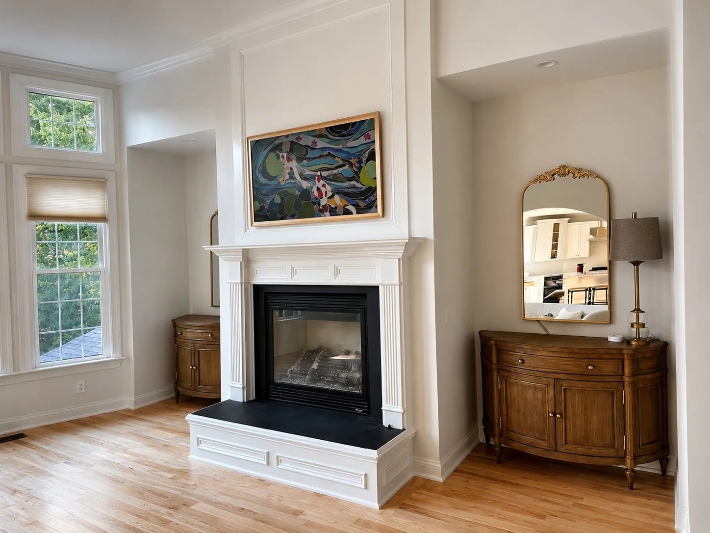 Samsung Frame TV above white fireplace Cary NC